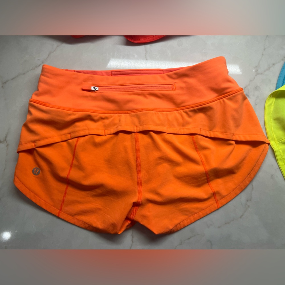 HIGHLIGHT ORANGE LULULEMON SPEED UP LR 2.5” SHORTS